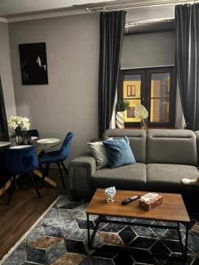 Apartament w centrum z widokiem na studnię 4